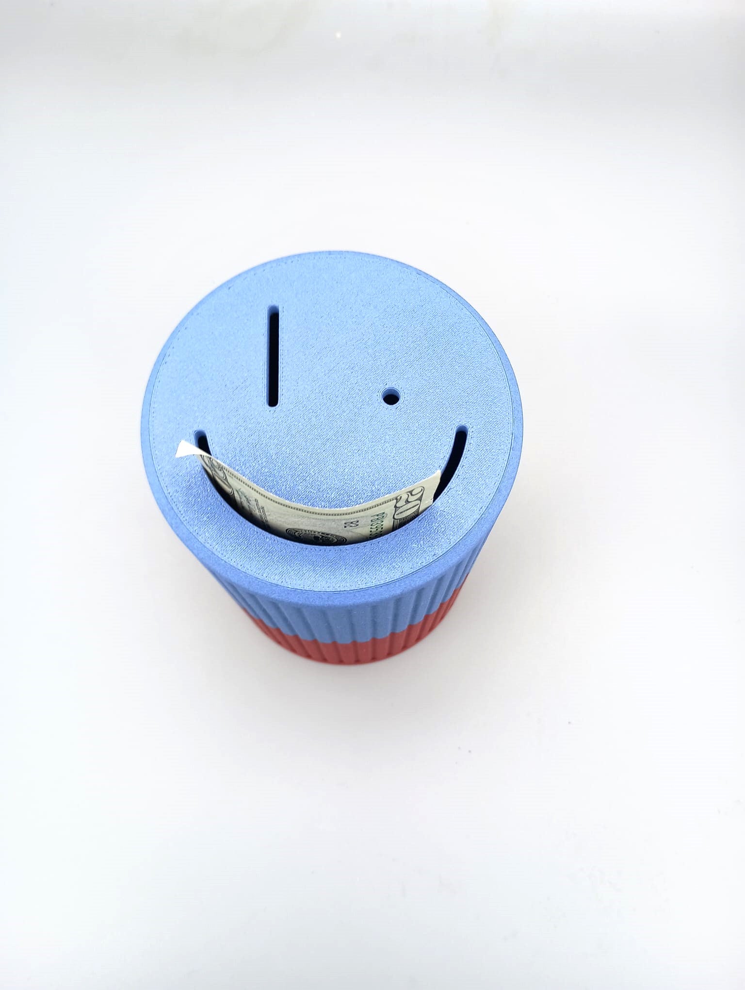 The smiley piggy bank digital